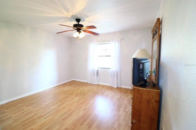 5351 SW 80th Pl, Ocala, FL 34476 - unfurnished room with ceiling fan, wood finished floors, and baseboards