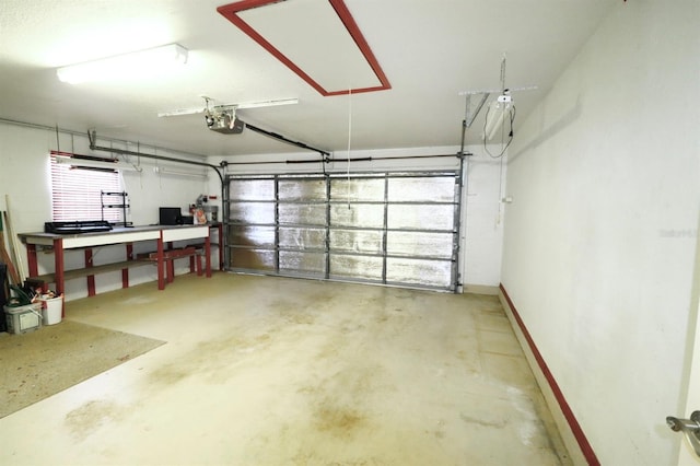 5351 SW 80th Pl, Ocala, FL 34476 - garage with a garage door opener and baseboards