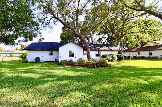 5351 SW 80th Pl, Ocala, FL 34476 - rear view of property featuring cooling unit and stucco siding