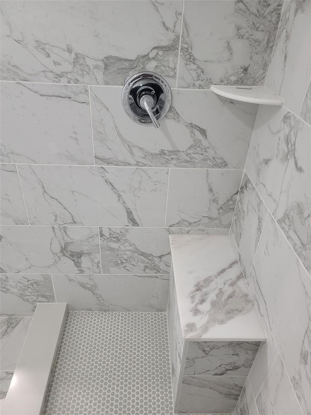 bathroom view of tiled shower