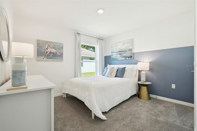 15838 SE 101st Cir, Summerfield, FL 34491 - carpeted bedroom featuring baseboards