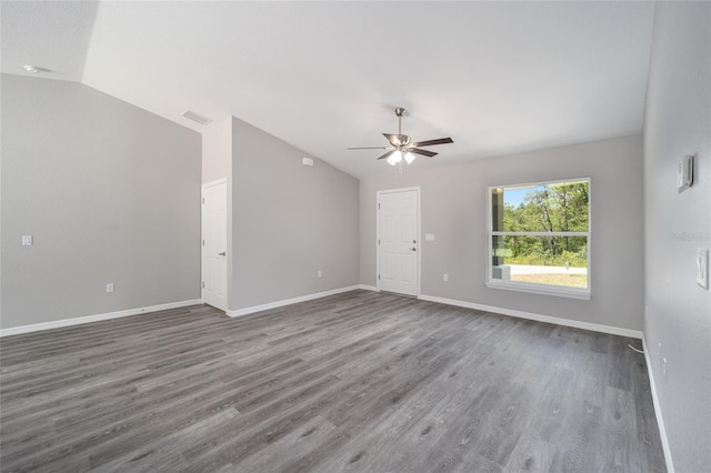23163 NW Shamrock Ave, Dunnellon, FL 34431 - unfurnished living room with lofted ceiling, ceiling fan, wood finished floors, and baseboards