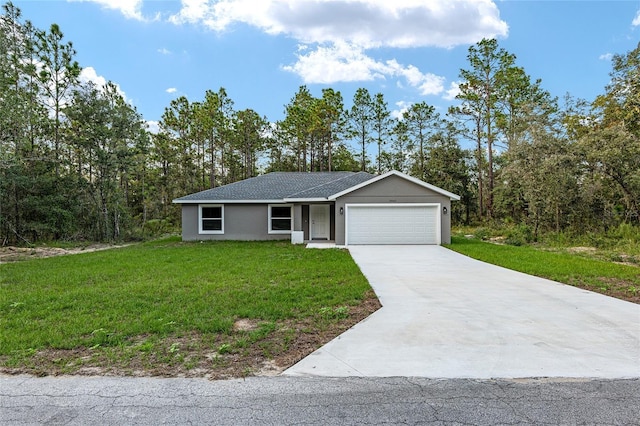 23163 NW Shamrock Ave, Dunnellon, FL 34431 - ranch-style house with a garage, a front lawn, driveway, and stucco siding