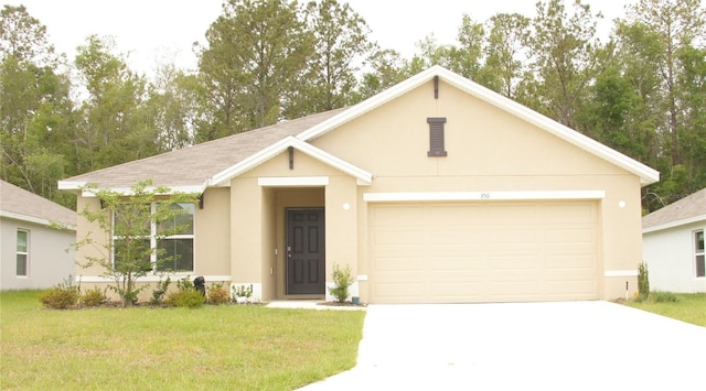 single story home featuring driveway, stucco siding, an attached garage, a front yard, and roof with shingles