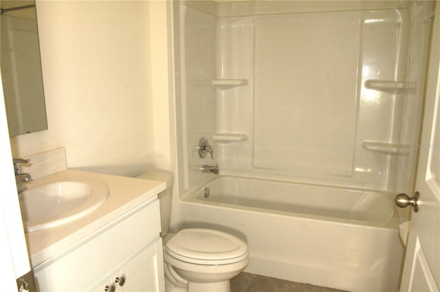 bathroom with toilet, vanity, bathing tub / shower combination, and tile patterned floors