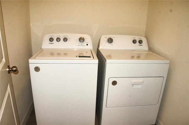 laundry room with washer and dryer