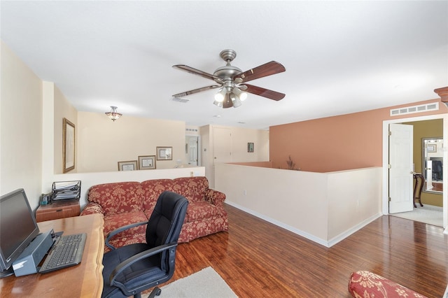 office with wood finished floors, ceiling fan, and baseboards
