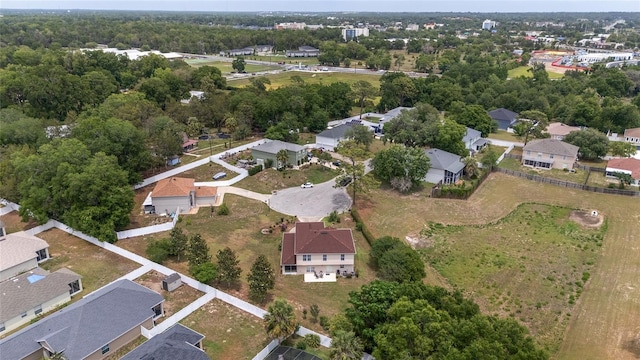 aerial overview of property's location with nearby suburban area