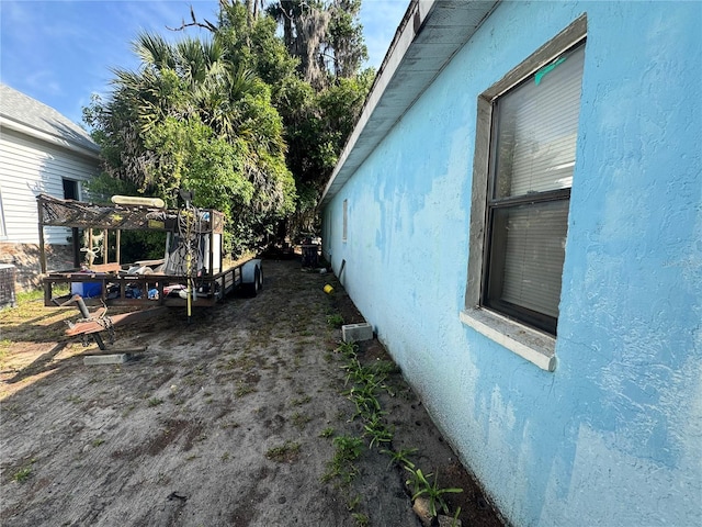 view of yard with central air condition unit
