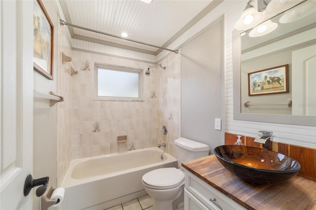 full bath with toilet, shower / washtub combination, tile patterned floors, vanity, and crown molding