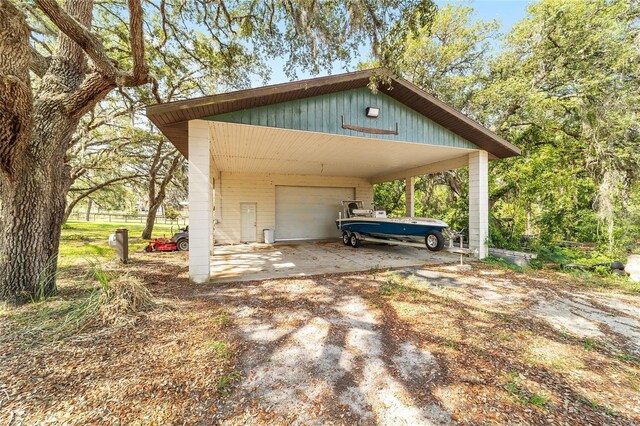 view of parking / parking lot with a garage