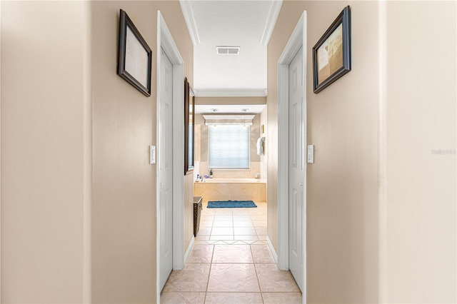 13885 Del Webb Blvd, Summerfield, FL 34491 - hallway with light tile patterned floors, crown molding, and baseboards