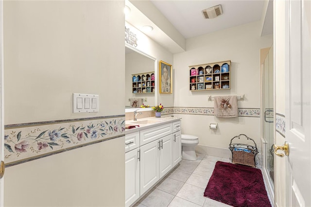 13885 Del Webb Blvd, Summerfield, FL 34491 - full bathroom with toilet, vanity, tile patterned flooring, and a stall shower