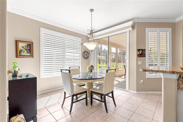 13885 Del Webb Blvd, Summerfield, FL 34491 - dining space with crown molding, baseboards, and light tile patterned flooring