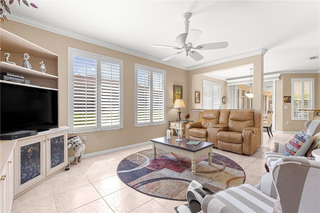 13885 Del Webb Blvd, Summerfield, FL 34491 - living area with ceiling fan, crown molding, baseboards, and light tile patterned floors