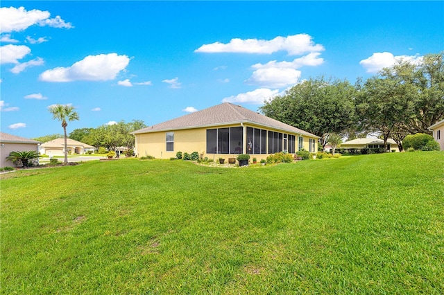 13885 Del Webb Blvd, Summerfield, FL 34491 - view of green lawn with a sunroom