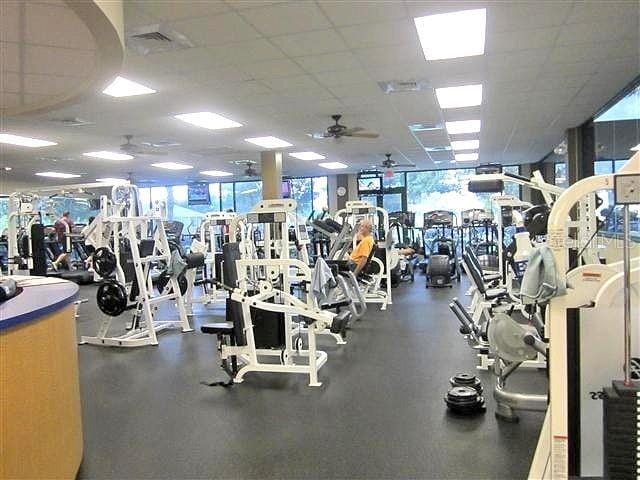 13885 Del Webb Blvd, Summerfield, FL 34491 - exercise room featuring ceiling fan and a paneled ceiling