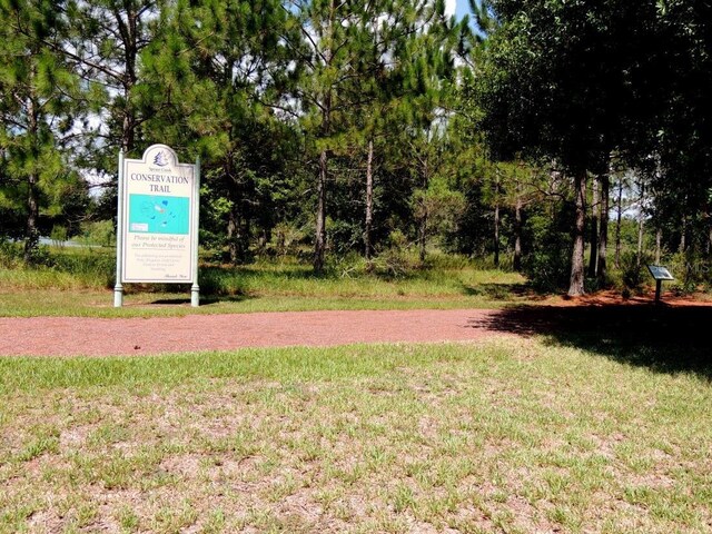 13885 Del Webb Blvd, Summerfield, FL 34491 - surrounding community with a yard