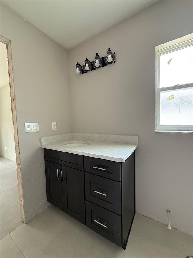 5359 NW 55th Pl, Ocala, FL 34482 - bathroom featuring tile patterned floors and vanity