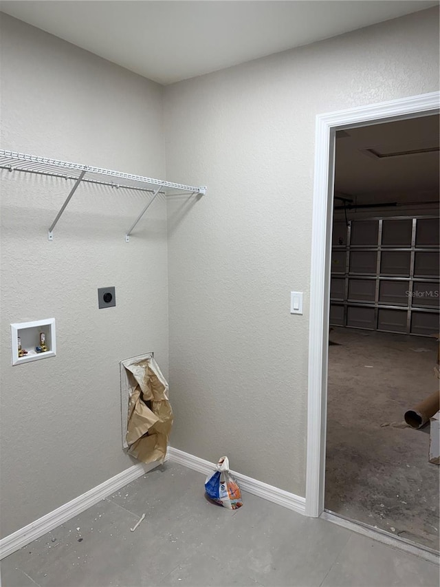5359 NW 55th Pl, Ocala, FL 34482 - washroom with hookup for an electric dryer, hookup for a washing machine, and baseboards