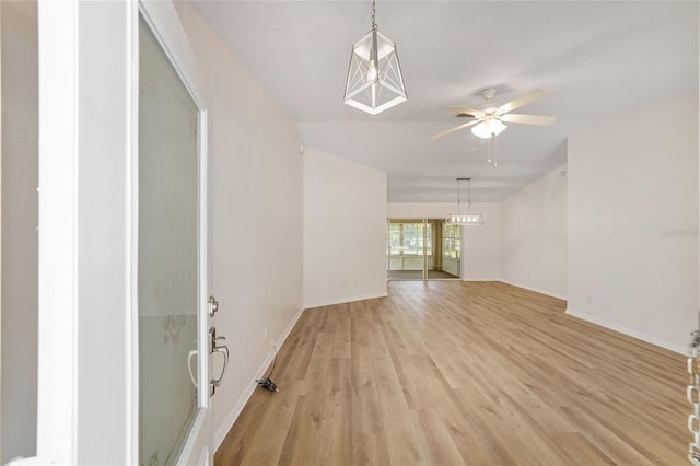 4886 NW 30th Pl, Ocala, FL 34482 - empty room with light wood-style floors, a ceiling fan, and baseboards