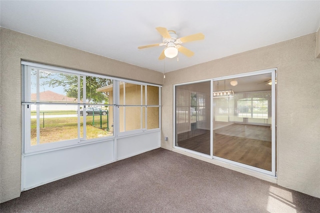 4886 NW 30th Pl, Ocala, FL 34482 - unfurnished sunroom featuring ceiling fan and plenty of natural light