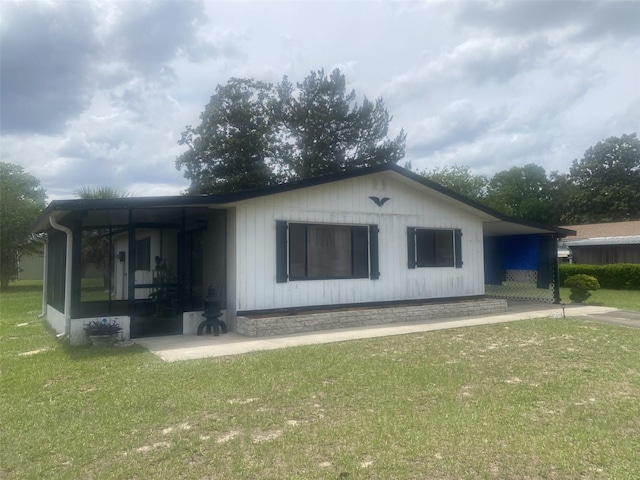 9920 SW 102nd Pl, Ocala, FL 34481 - view of side of property featuring a lawn