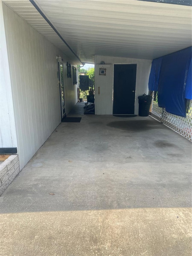 9920 SW 102nd Pl, Ocala, FL 34481 - view of vehicle parking featuring an attached carport