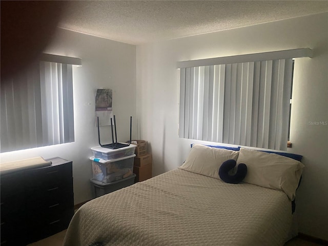 9920 SW 102nd Pl, Ocala, FL 34481 - bedroom featuring a textured ceiling