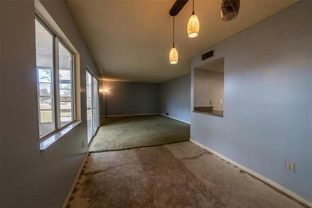 empty room with baseboards and carpet floors