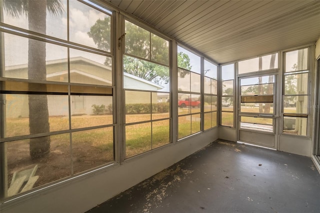 unfurnished sunroom with healthy amount of natural light