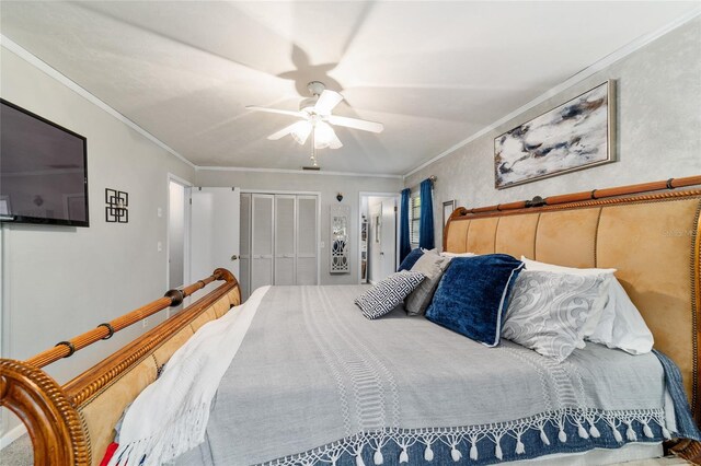 bedroom featuring a closet, crown molding, and ceiling fan