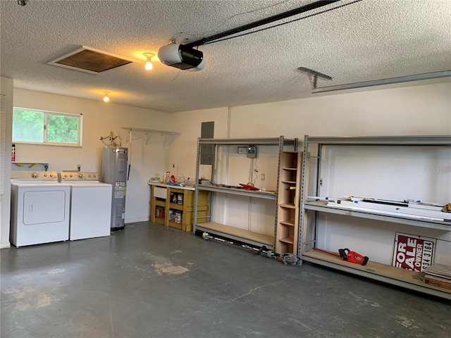 11445 SW 84th Avenue Rd, Ocala, FL 34481 - garage with water heater, a garage door opener, washing machine and clothes dryer, and a workshop area