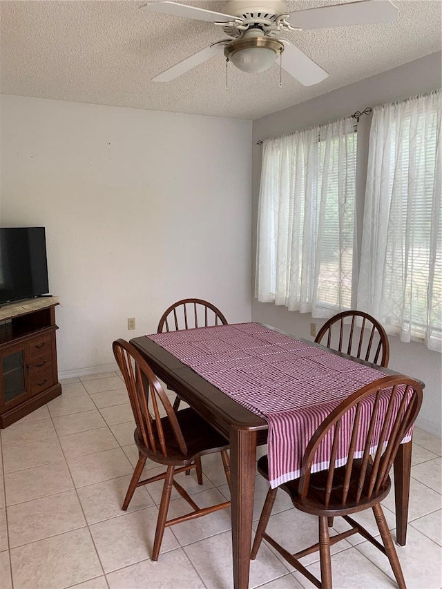 11445 SW 84th Avenue Rd, Ocala, FL 34481 - dining space featuring healthy amount of natural light, ceiling fan, a textured ceiling, and light tile patterned floors