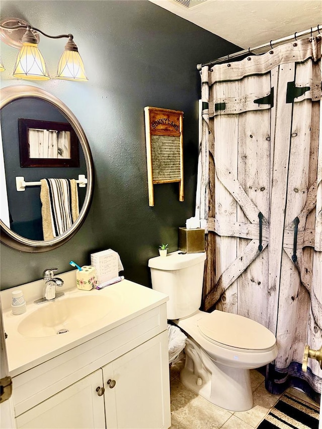 3106 Silver Palm Dr, Edgewater, FL 32141 - bathroom with toilet, vanity, tile patterned floors, and curtained shower