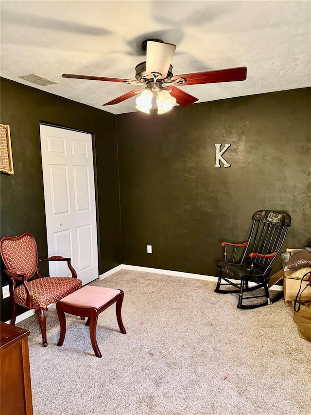 3106 Silver Palm Dr, Edgewater, FL 32141 - sitting room featuring carpet flooring, a ceiling fan, and baseboards