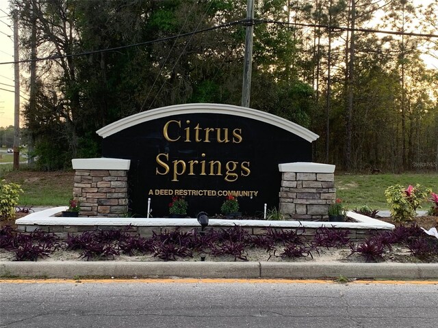 view of community sign