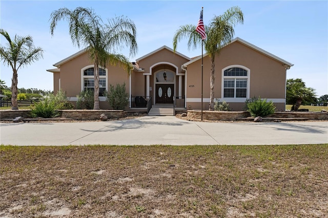 4725 County Road 121d, Wildwood, FL 34785 - view of front of home with stucco siding
