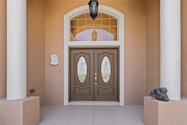4725 County Road 121d, Wildwood, FL 34785 - entrance to property featuring french doors and stucco siding