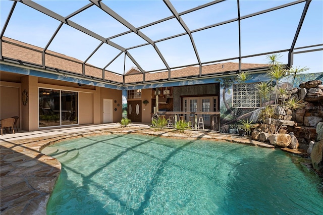 4725 County Road 121d, Wildwood, FL 34785 - rear view of property with a patio area, an outdoor pool, stucco siding, and glass enclosure