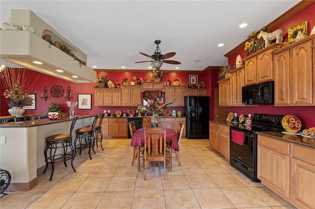 4725 County Road 121d, Wildwood, FL 34785 - kitchen with black appliances, ceiling fan, dark countertops, light tile patterned floors, and recessed lighting
