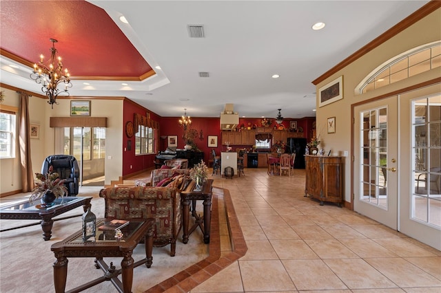 4725 County Road 121d, Wildwood, FL 34785 - living room with a chandelier, french doors, plenty of natural light, light tile patterned floors, and recessed lighting