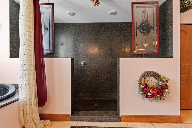 4725 County Road 121d, Wildwood, FL 34785 - bathroom featuring tile patterned floors and a walk in shower