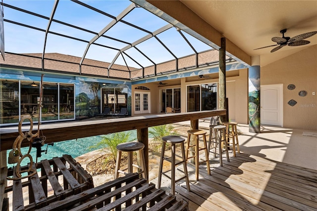 4725 County Road 121d, Wildwood, FL 34785 - wooden deck featuring ceiling fan, a patio, and glass enclosure
