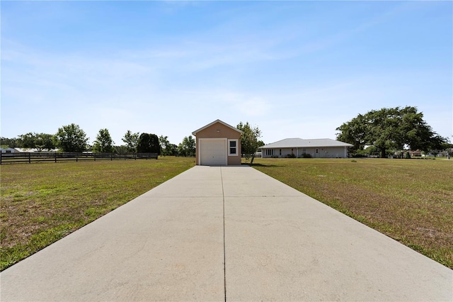4725 County Road 121d, Wildwood, FL 34785 - view of front facade with concrete driveway and an outdoor structure