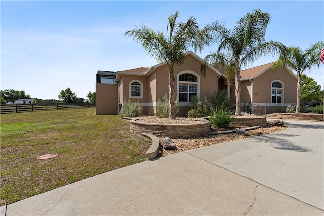 4725 County Road 121d, Wildwood, FL 34785 - view of front facade featuring stucco siding