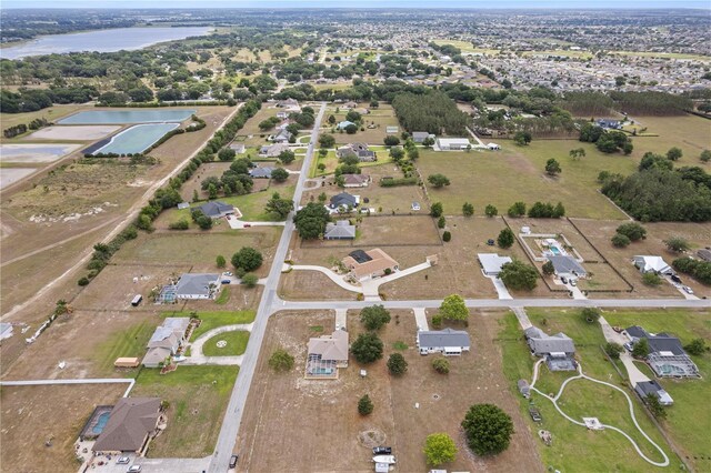 4725 County Road 121d, Wildwood, FL 34785 - aerial overview of property's location with a large body of water