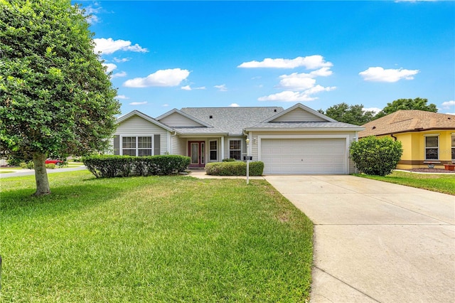 1402 Arredondo Dr, The Villages, FL 32162 - ranch-style house featuring a garage, a front lawn, concrete driveway, and roof with shingles