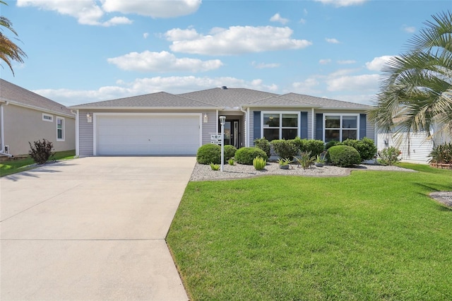 single story home with concrete driveway, an attached garage, and a front yard