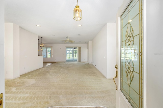 9649 SW 90th St, Ocala, FL 34481 - entryway with carpet floors, a ceiling fan, and recessed lighting